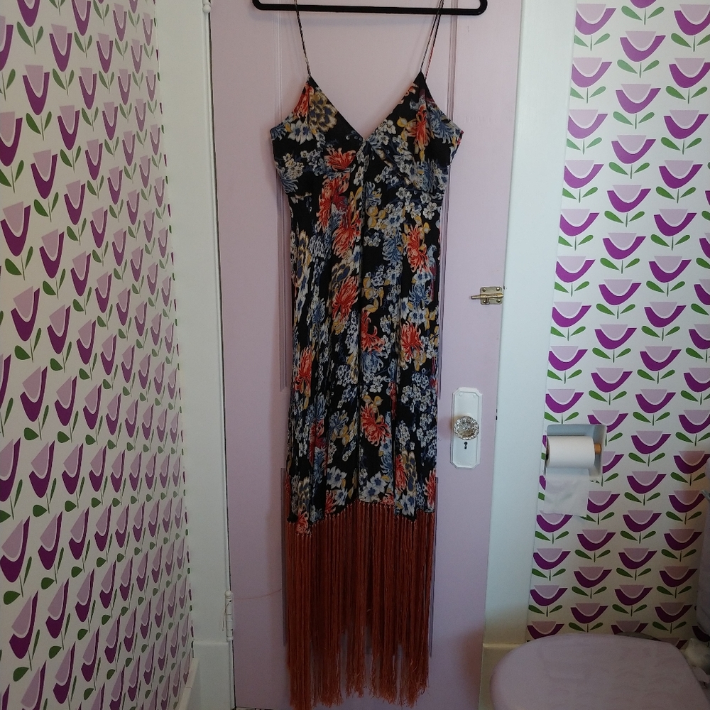 Showstopping slip dress with fringe